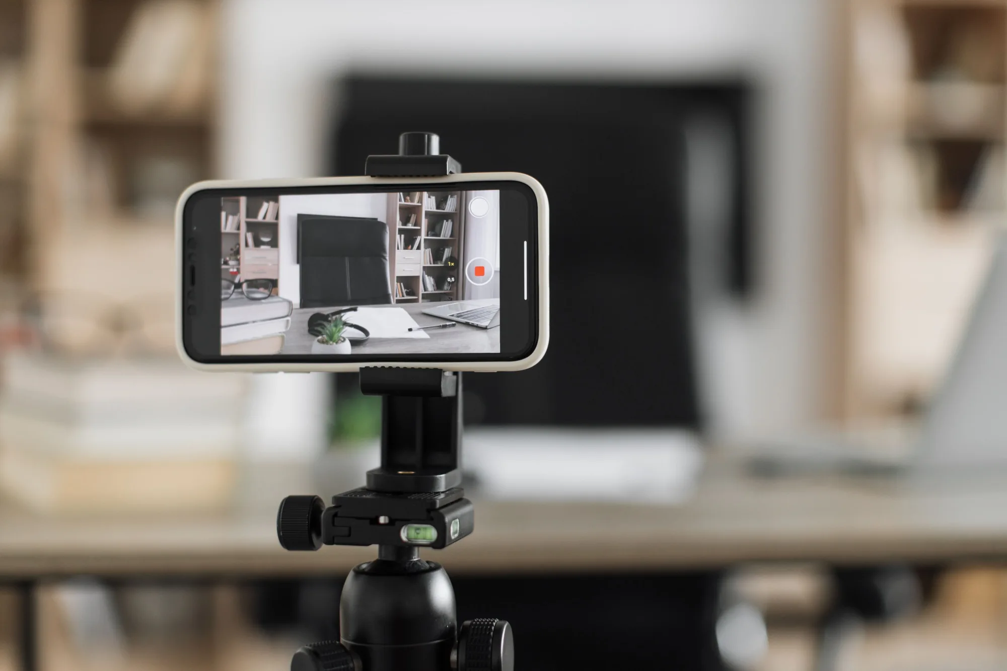 Blogger or content creator putting laptop computer, reports, papers on table